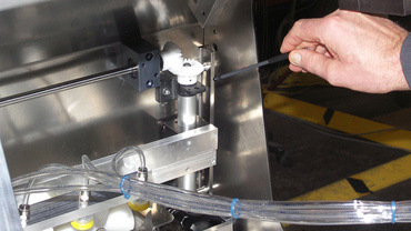 Formatverstellung Abziehstation